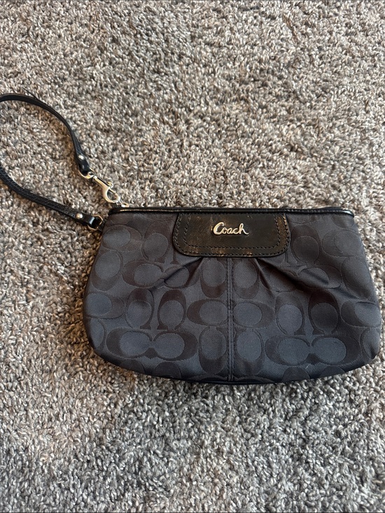 Coach Handbags - Coach Black Signature Wristlet Clutch with Silver Logo